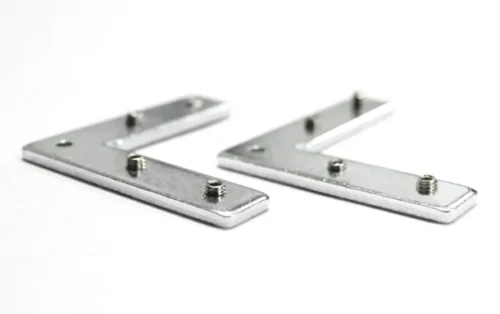 Two silver metal L-shaped brackets with small bolts on a white background.