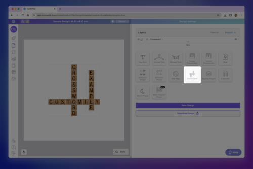 Interface of a crossword design tool showing wooden letter tiles forming a grid word layout (CUSTOM, CROSSWORD) on the canvas side. • merchOne